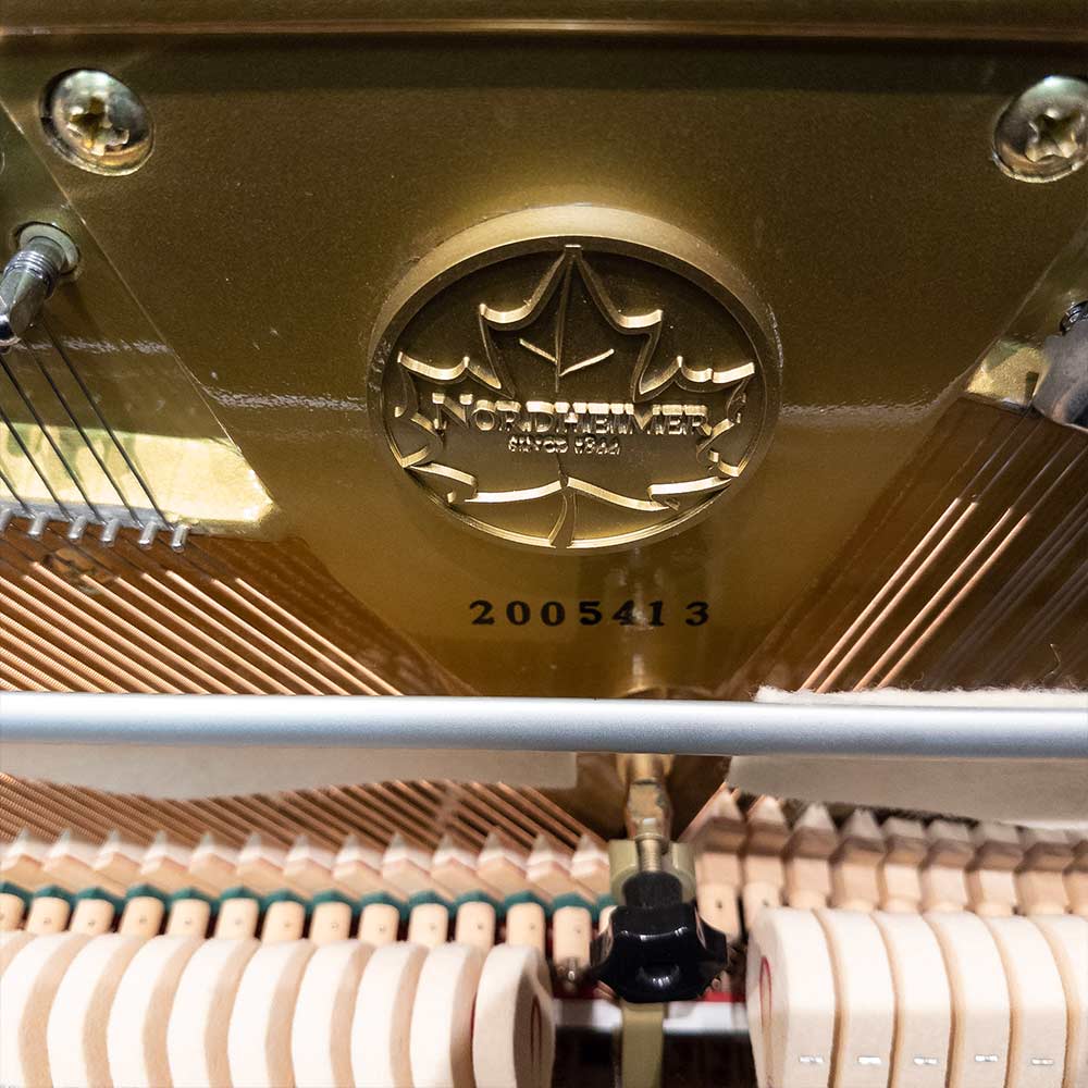 Used Nordheimer XH132 Upright Piano in Polished Ebony Logo badge