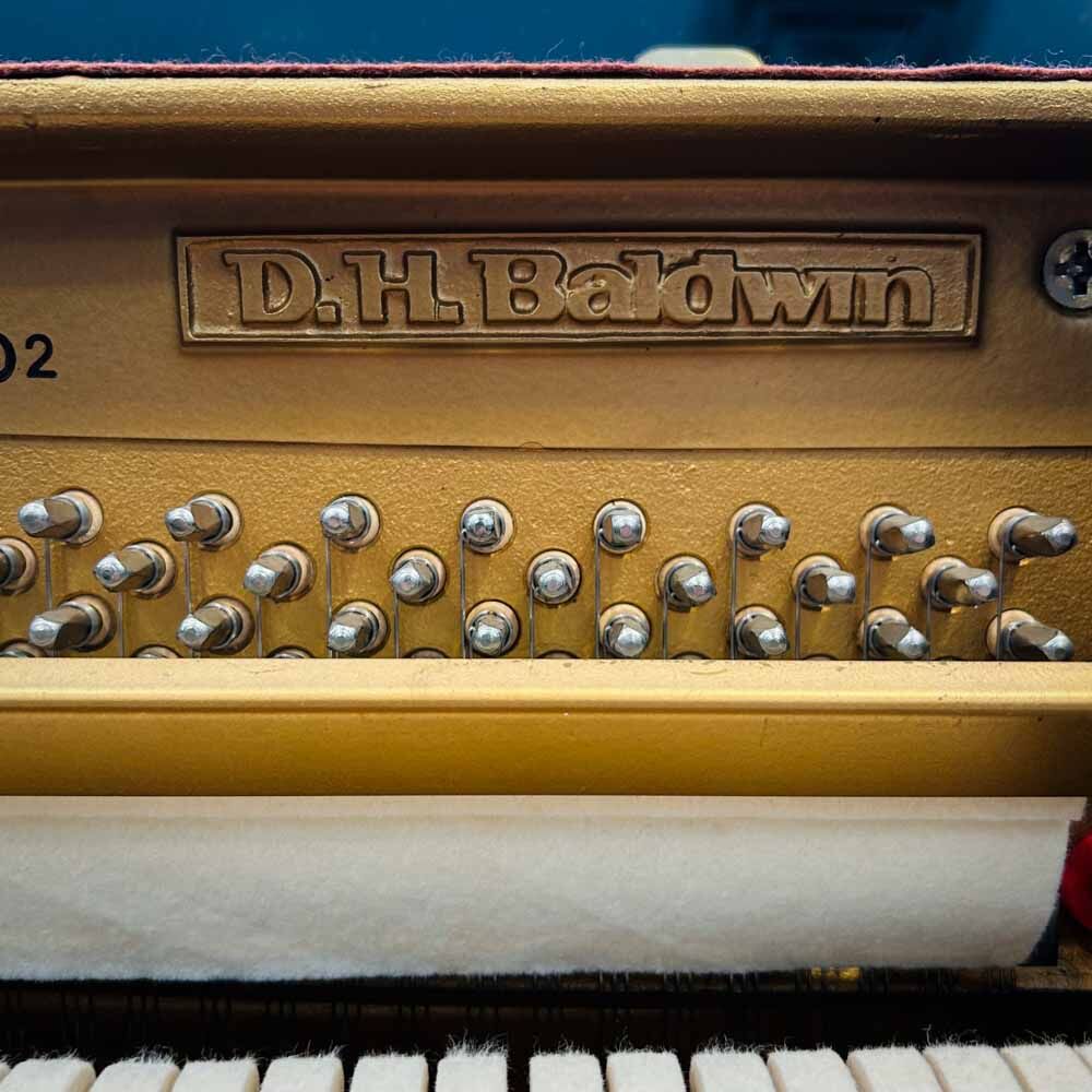 Baldwin K107 Upright Piano Logo