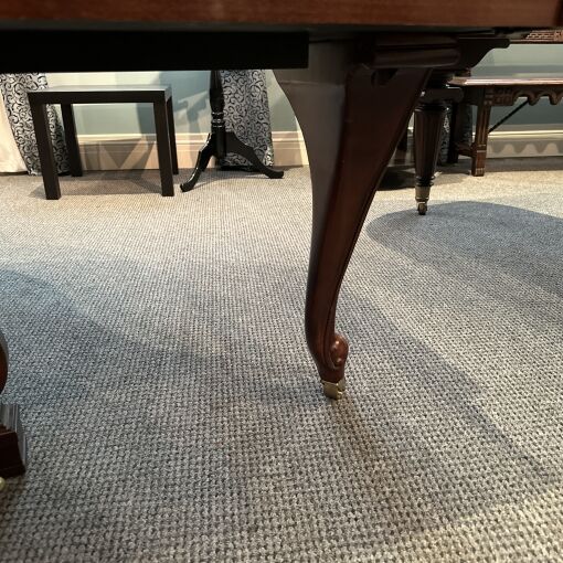Image of a Chickering and Sons Baby grand piano leg