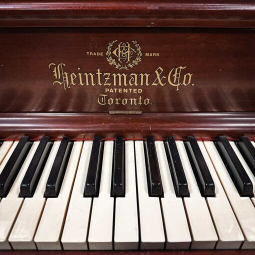 Used Heintzman 54" Upright Piano in Satin Mahogany Logo