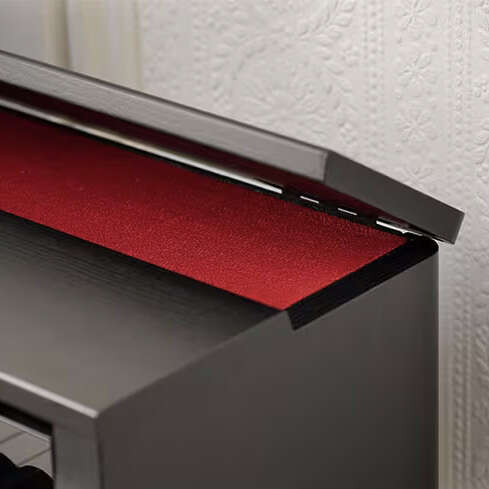 The top-lid of the Casio AP-550, shown in the up position